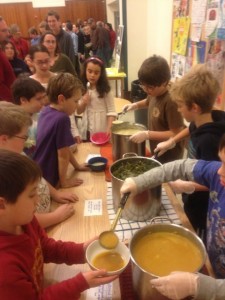 Fourth and fifth graders serving homemade soups and breads to Dubliners on Friday, November 30, at the Dublin Consolidated School. Just look at how long the line of people is!