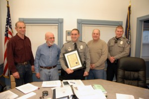 Selectmen Sterling Abram and Charles Champagne, to the left of Officer Tim Suokko, with Interim Selectman Sturdy Thomas and Officer Joel Chidester to the right, flank Dublin’s newly appointed Master Patrolman. Photo by Sally Shonk