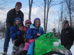 Mike Doherty gives a push to Hailey Albert, Jason Bergeron, Hannah Doherty and Hailey Doherty.