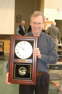 Chris Gallagher receives a wall clock for being selected as Citizen of the Year. Photo by Sally Shonk