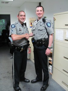 Officer Dan Cheshire (at right) welcomed by Master Patrolman Suokko.