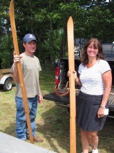 Bob and Mary Edick hoped to sell a pair of antique skis at the Yankee Barn Sale, held July 27th, on Yankee Field. Photo by M. Gurney