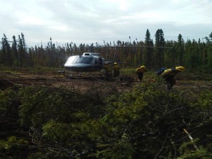 Andy Freeman, far right, fighting a 50,000-acre wildfire 400 miles north of Montreal, Quebec. 