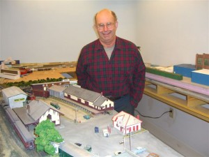 Larry Kemp shows his model railroad project based on earlier days of downtown Peterborough. Photo by Ramona Branch
