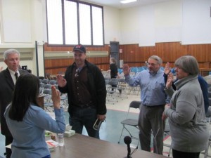 Jeannine Dunne, Town Clerk, oversaw the swearing in of several new officers to town, although several were not present. Town officers elected for three-year terms include Walter Snitko as Selectman; Judy Knapp and Bill Gurney on the Budget Committee; and Cemetery Trustee is Brooks Johnson. On the Planning Board, we have Bruce Simpson and Steven Baldwin, and the new Trustee of Trust Funds is Christopher Flynn. Bill Gurney will be joining the Library Trustees. Tim Clark was re-elected to both Town Moderator and ConVal District Moderator. Of the 1,192 voters on the checklist, votes were cast by 29% (346).