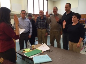 Swearing In: Some of the new candidates were on hand at the conclusion of Town Meeting to be sworn in by Town Clerk Jeannine Dunne.