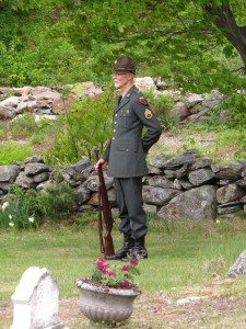 Tim Murray at last year’s Memorial Day as he stood ready to fire his rifle in a salute to those who have given their lives for our country. “Taps” then followed. Photo by Hal Close.