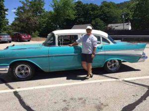 Lou-Ann Poor stands alongside her ‘57 Chevy, a gift for her 60th birthday.